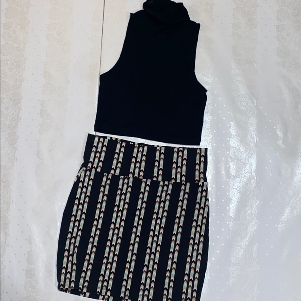 Black turtle neck with mini skirt